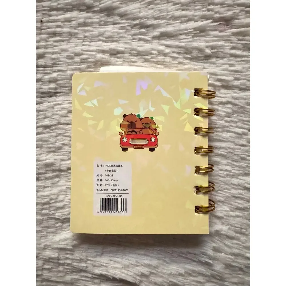 Capybara A6 spiral mini notebook with capybara in a red car design 4 dividers